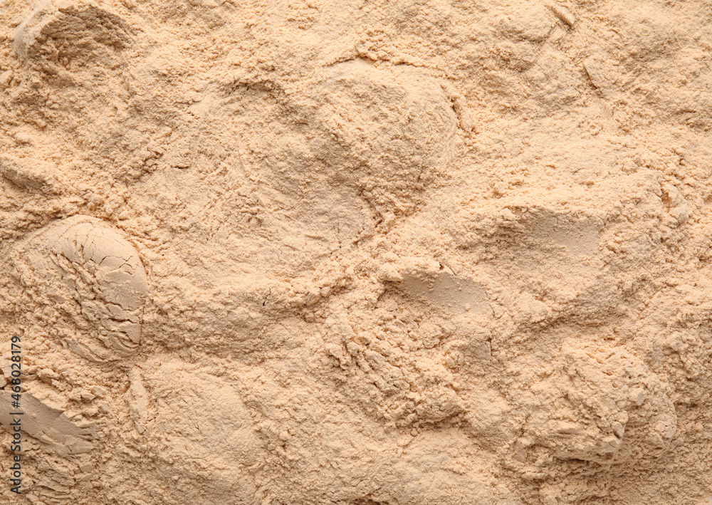 Whey protein powder as background Whey protein powder as background