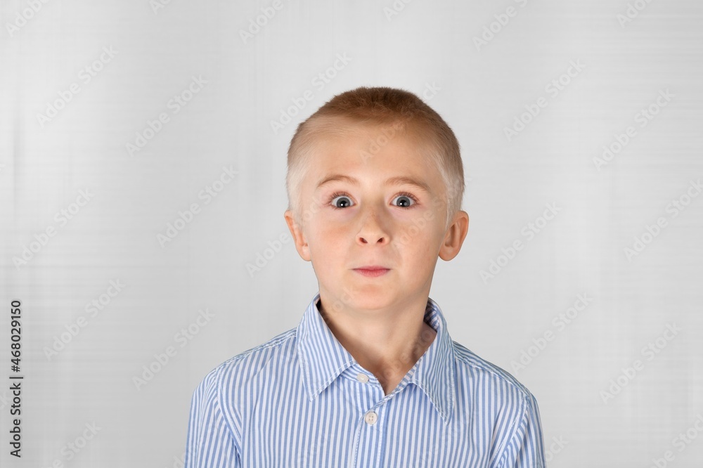 Amazed or surprised child boy with big eyes. Good or bad news Amazed or surprised child boy with big eyes. Good or bad news