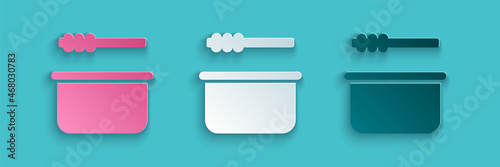 Paper cut Sauna bucket and ladle icon isolated on blue background. Paper art style. Vector Illustration