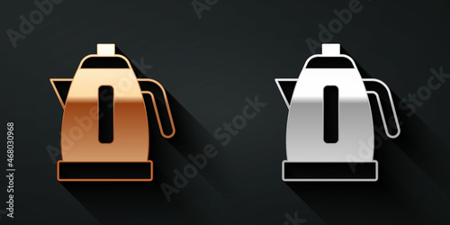 Gold and silver Electric kettle icon isolated on black background. Teapot icon. Long shadow style. Vector