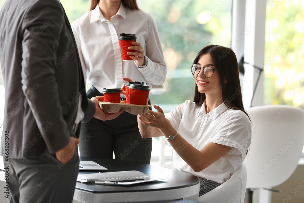 © Pixel-Shot - Business people having coffee break in office