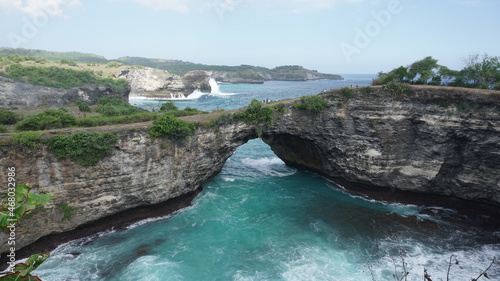 view of the ocean in the channel bridge Nusa Penida broken beach summer vacation Bali Indonesia exotic relax beautiful waves