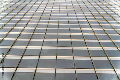 Tinted glass curtain wall of a building with vertical glass beams at Salt Lake City  Utah