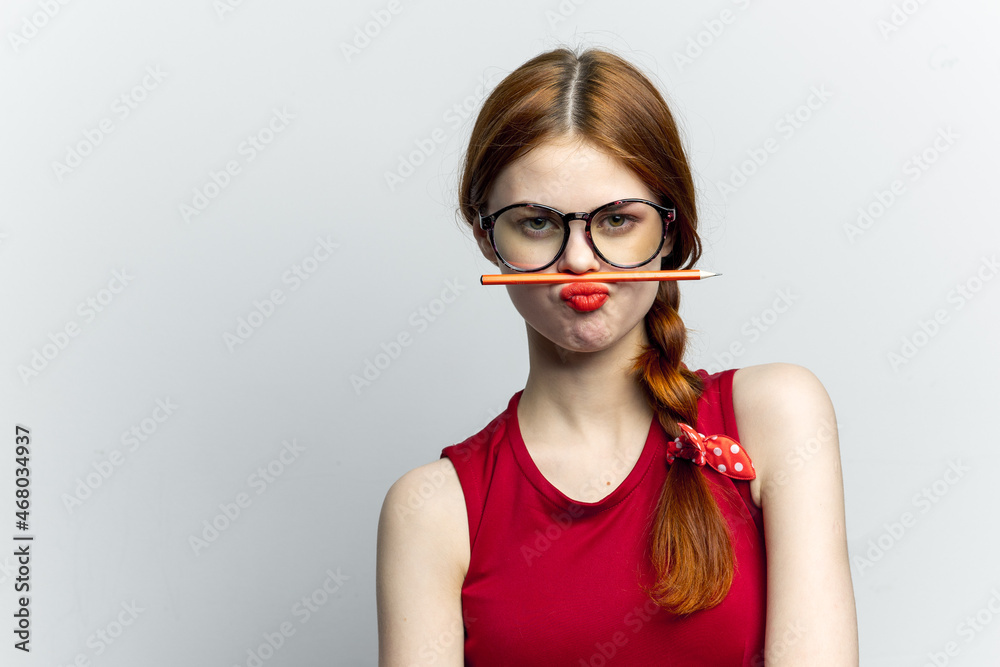 cheerful woman with glasses red dress notepad work