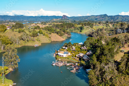 large aerial view of villa and cabin compound in nature landscape from a drone