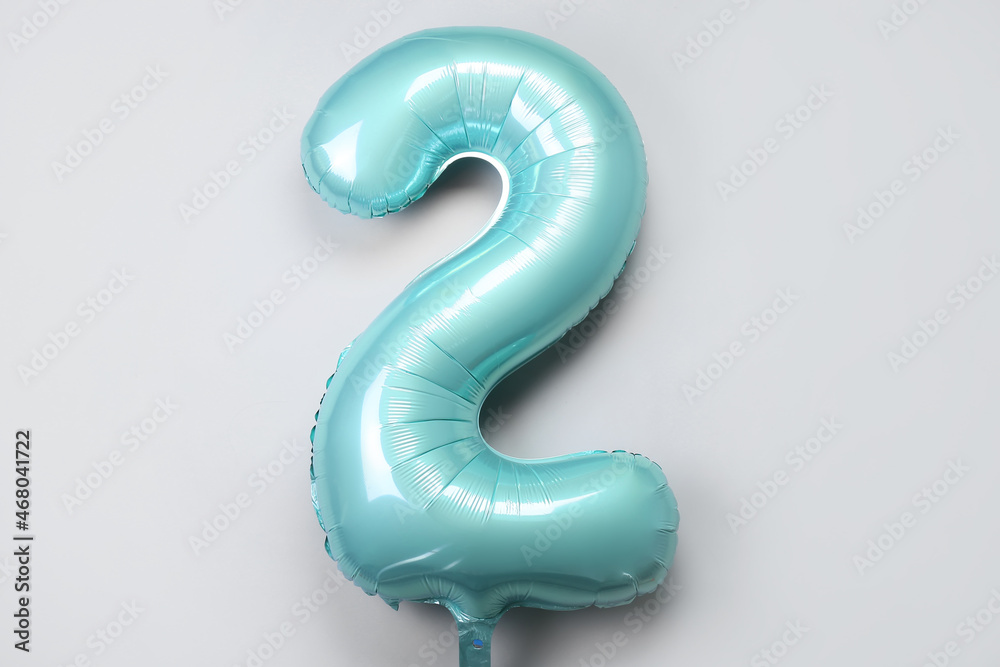 Balloon in shape of figure 2 on light background Balloon in shape of figure 2 on light background