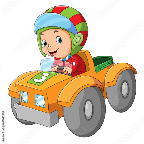 The boy is playing and riding a car
