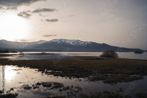 Beautiful mountains landscape. Small lake and mountain at the sunrise.