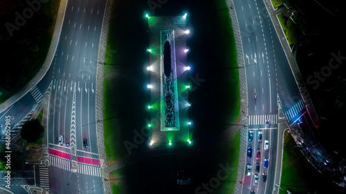 Monumento As Bandeiras in Ibirapuera Park in São Paulo, SP, Brazil.
Night aerial view. Hyperlapse. Selective focus