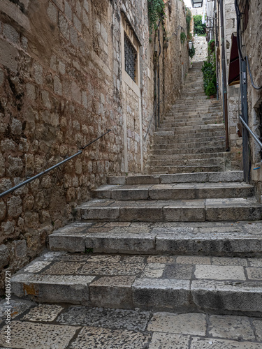 narrow passageway with stone steps in ancient city of Dubrovnik  Croatia