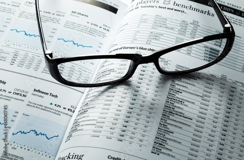 Glasses On Financial Reports Close-up