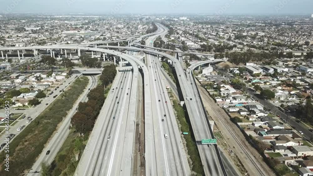 Drone 4k. Aerial view of Los Angeles freeway. Cars driving towards downtown LA. Concept of urban life, travel destination in America, modern city in USA. Drone 4k. Aerial view of Los Angeles freeway. Cars driving towards downtown LA. Concept of urban life, travel destination in America, modern city in USA.