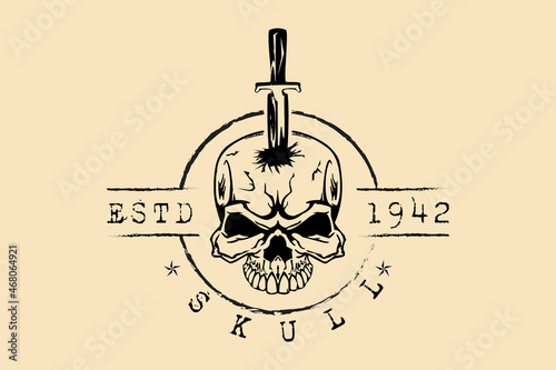 Horrible skull design with knife stuck from above, perfect for t-shirts and tattoos