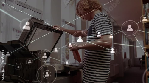 Animation of network of connections over male student using copying machine