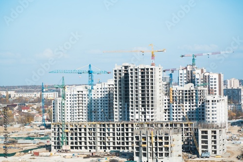The architectural complex of residential buildings on sky background