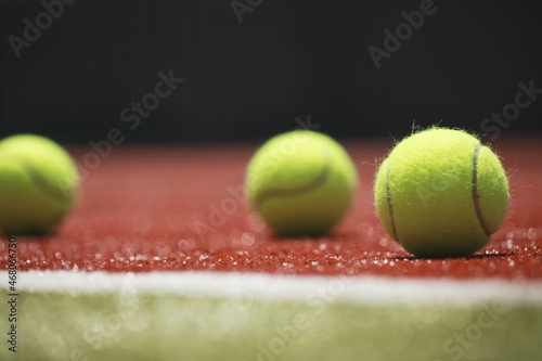 Tennis balls on a tennis court © BillionPhotos.com