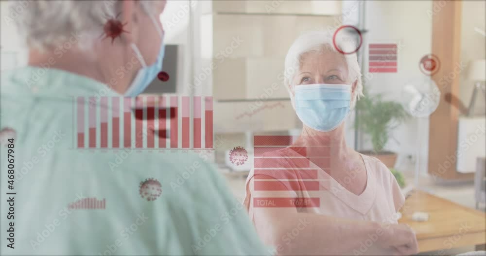 Animation of covid 19 cells and statistics over senior man and woman in face masks by window Animation of covid 19 cells and statistics over senior man and woman in face masks by window