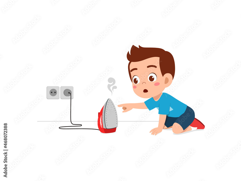 little boy curious to touch hot electric iron little boy curious to touch hot electric iron