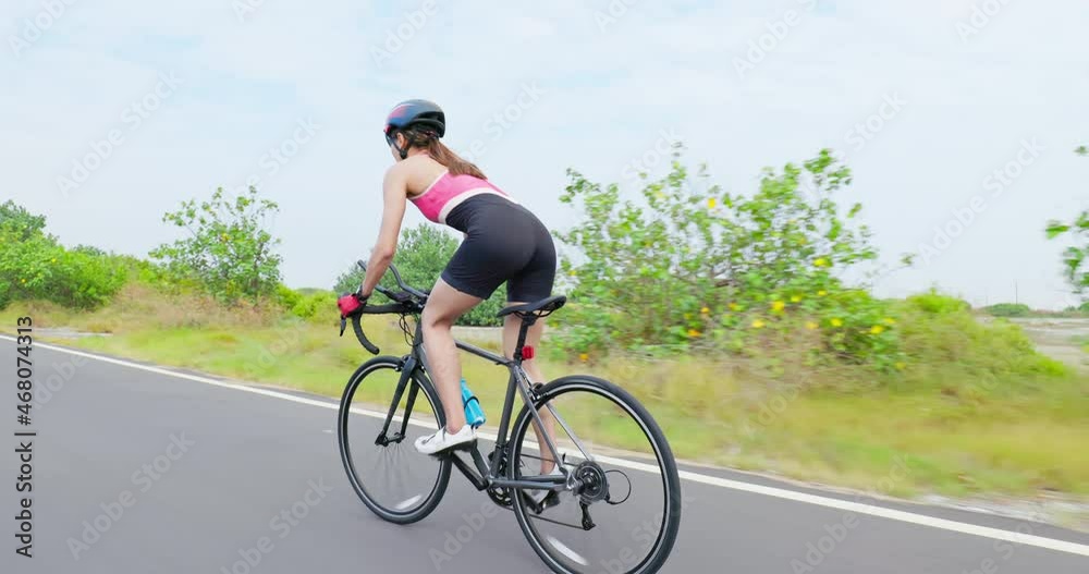 Asian young woman ride bicycle Asian young woman ride bicycle