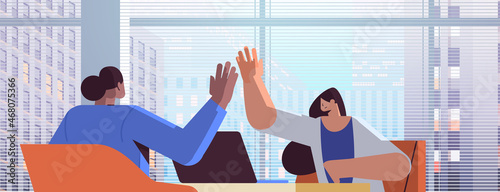 mix race businesspeople giving high five successful teamwork agreement concept