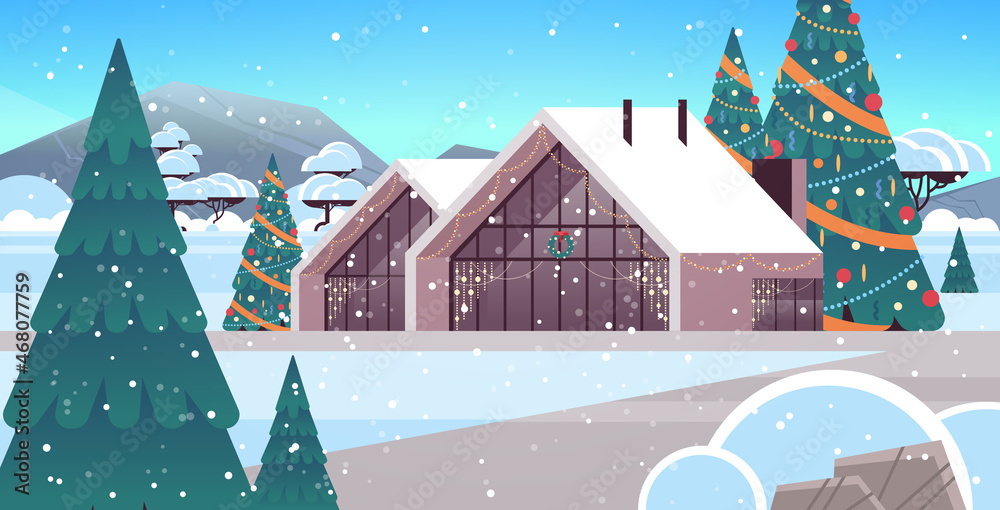 snow covered decorated house in winter season home building with decorations for new year and christmas celebration