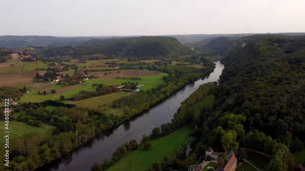 Aerial view of Dordogne river Old medieval stone village of Beynac-et-Cazenac Aerial view of Dordogne river Old medieval stone village of Beynac-et-Cazenac