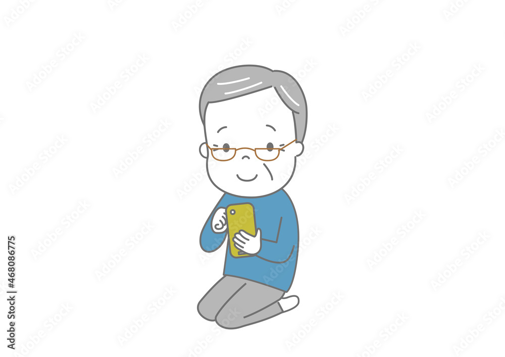 笑顔でスマートフォンを操作している高齢男性　おじいさん