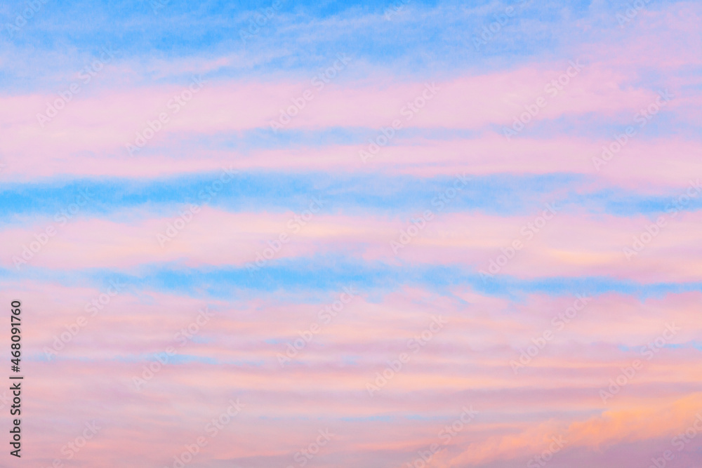 Pink сirrus clouds blue sky background closeup, red dawn cirrostratus cloud texture, purple evening sunset, morning sunrise clouds, striped cloudy skies, cloudscape, beautiful heaven view, cloudiness