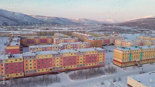 Footage of the small polar town of Bilibino in Chukotka, taken in winter at sunset on a quadcopter