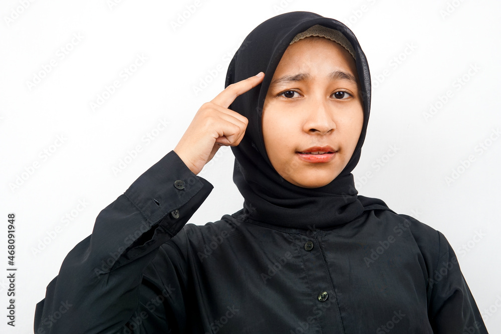 Closeup of beautiful young Muslim woman thinking, looking for ideas, isolated Closeup of beautiful young Muslim woman thinking, looking for ideas, isolated