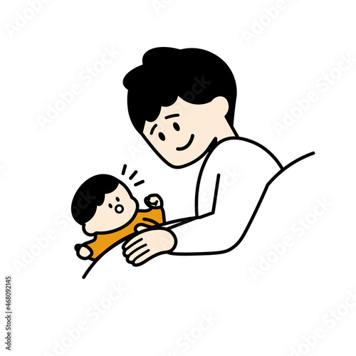 寝ようとしている赤ちゃんと父親　カラー