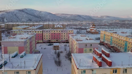 Footage of the small polar town of Bilibino in Chukotka, taken in winter at sunset on a quadcopter