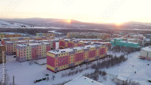 Footage of the small polar town of Bilibino in Chukotka, taken in winter at sunset on a quadcopter
