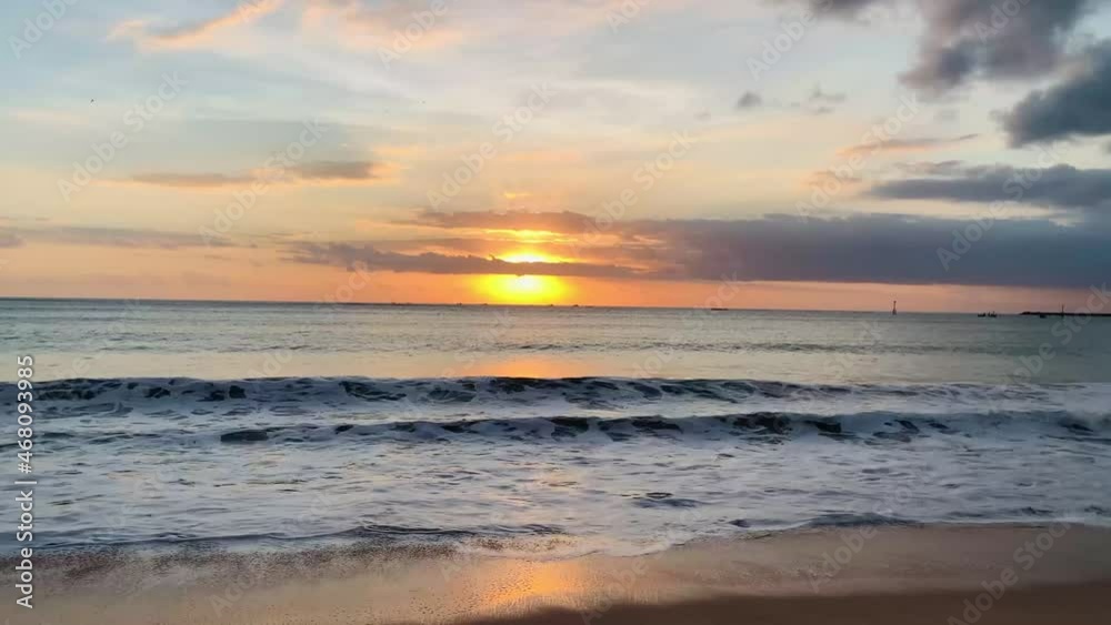 Sunset in Bali Jimbaran Beach Ocean Water Waves on Shore Golden Hour Sunset in Bali Jimbaran Beach Ocean Water Waves on Shore Golden Hour
