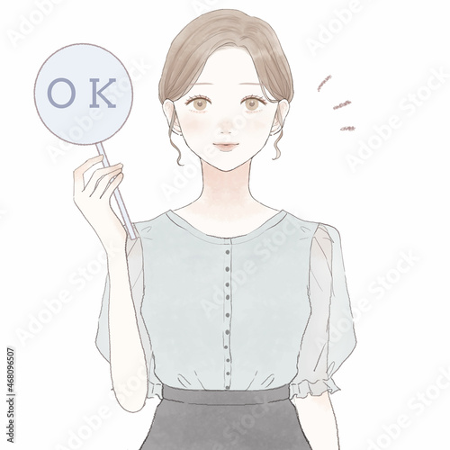 OKサインを出す女性