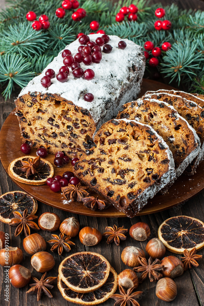 Traditional homemade Christmas cake sprinkled with sugar powder Traditional homemade Christmas cake sprinkled with sugar powder