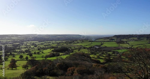 Beautiful forward aerial shot over the East Devon Countryside from Dumpdon Hill in the Blackdown Hills England UK photo