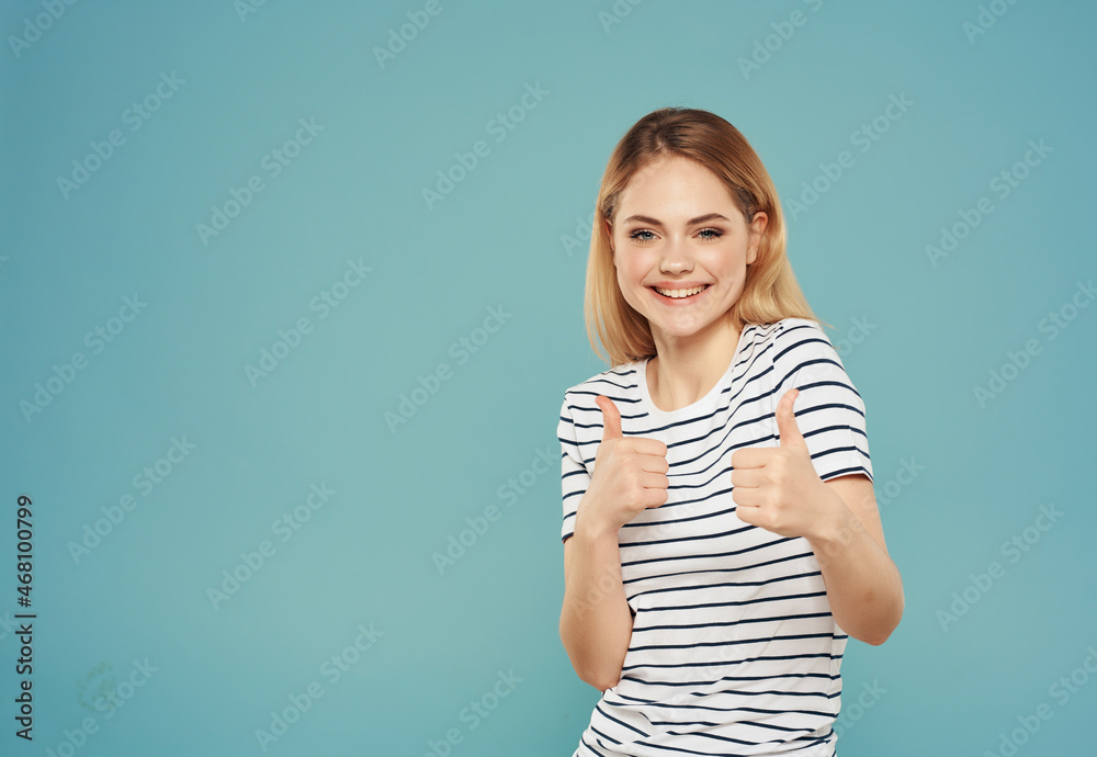 Fototapeta premium woman in striped t-shirt studio emotion posing model