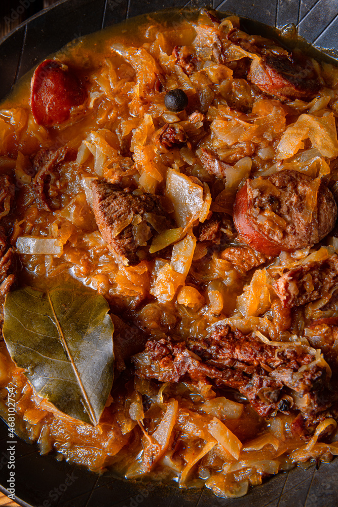 Polish bigos cooked according to an old recipe with wine and plum Polish bigos cooked according to an old recipe with wine and plum