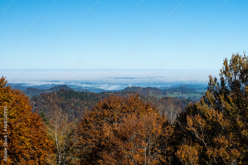 Amazing view from Schnebelhorn, a hill in Cantone Zurich, over colorful autumnal forests