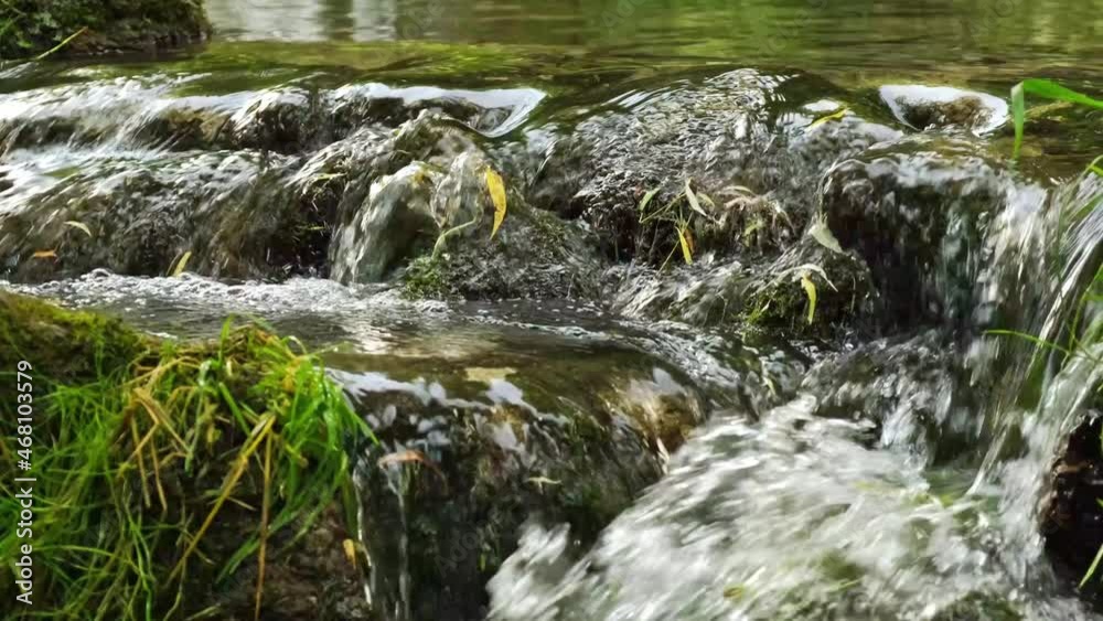 Mossy waterfall. Mountain river with forest landscape. Waterfall river stream in green nature forest landscape. Panoramic beautiful deep forest waterfall. Waterfall on mountain river in the forest. Mossy waterfall. Mountain river with forest landscape. Waterfall river stream in green nature forest landscape. Panoramic beautiful deep forest waterfall. Waterfall on mountain river in the forest.