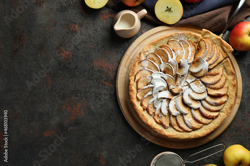 Concept of tasty food with apple pie on textured background