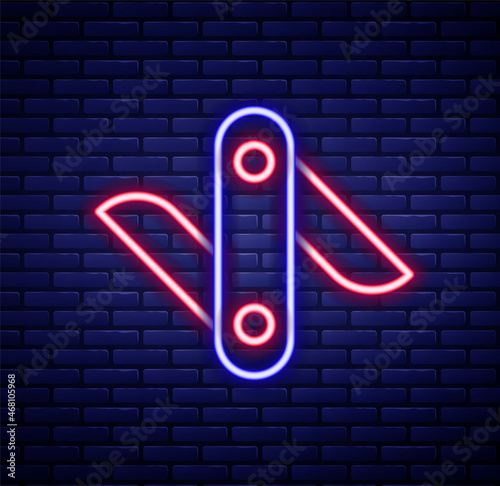 Glowing neon line Swiss army knife icon isolated on brick wall background. Multi-tool, multipurpose penknife. Multifunctional tool. Colorful outline concept. Vector