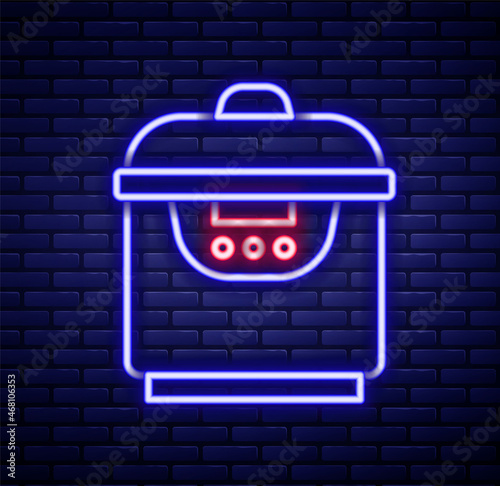 Glowing neon line Slow cooker icon isolated on brick wall background. Electric pan. Colorful outline concept. Vector