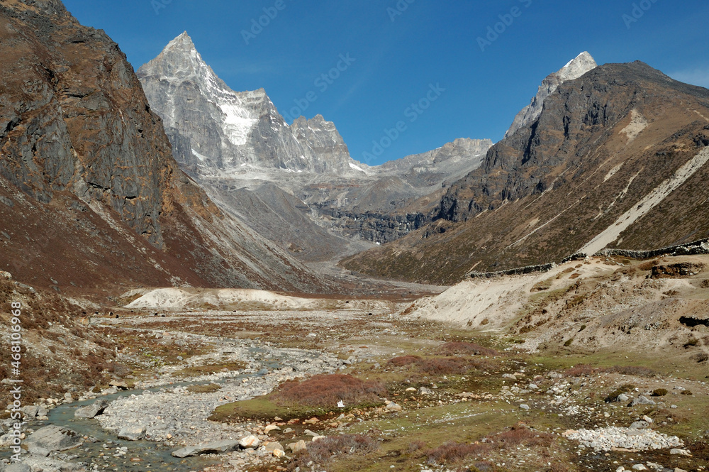 Valley with river in Himalaya mountains during the trek to Everest base camp
