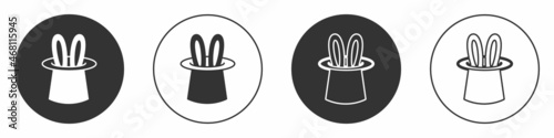 Black Magician hat and rabbit ears icon isolated on white background. Magic trick. Mystery entertainment concept. Circle button. Vector