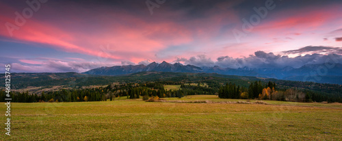 A colorful sunset over the autumnal Tatra Mountains. The pass over Lapszanka in Poland. © Patryk Kosmider