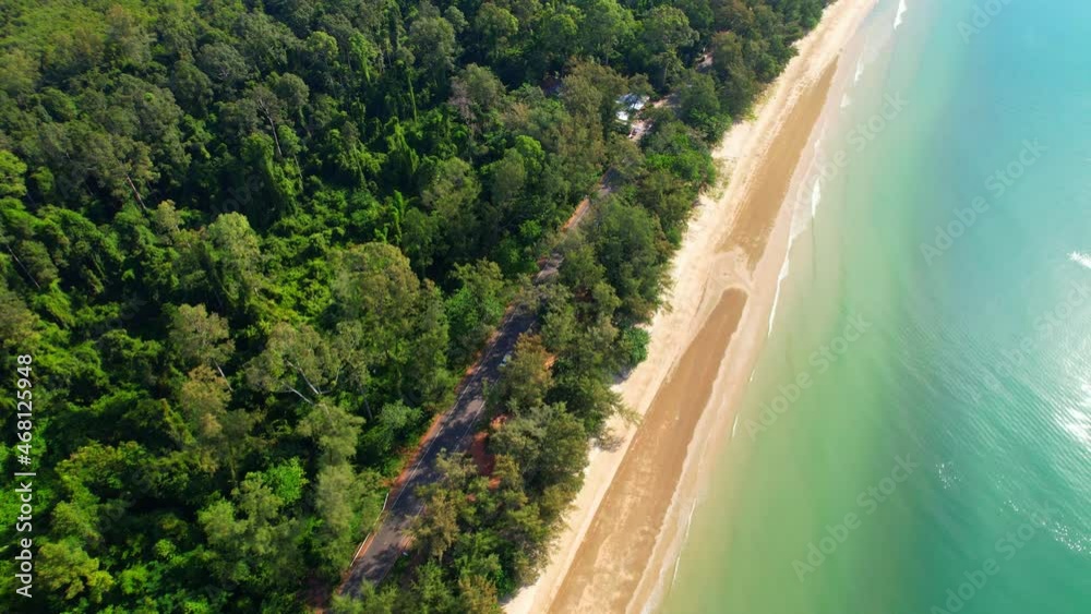 4K aerial view from a drone. coast with turquoise waters and beautiful beaches. Lots of pine trees on the beach. bright weather of tropical seas in Rayong Province, Thailand
4K aerial view from a drone. coast with turquoise waters and beautiful beaches. Lots of pine trees on the beach. bright weather of tropical seas in Rayong Province, Thailand
