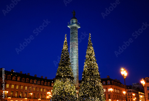 Christmas magic in Paris, France. Christmas trees at Place Vendome decorated for holidays. photo