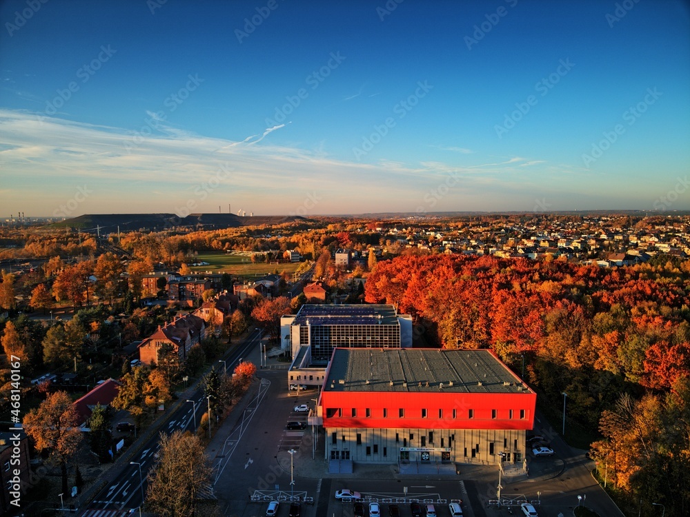 sports and entertainment hall, mining heap and blue sky over the town of Rybnik